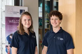 Two student ambassadors at Thom Building reception