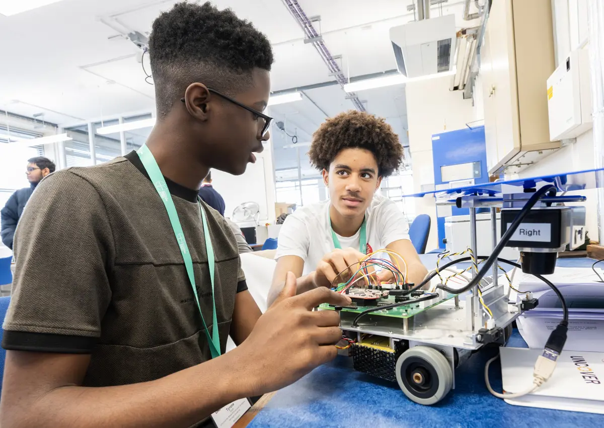Participants of Access programme Uncover Engineering 2024 doing a Mobile Robots activity