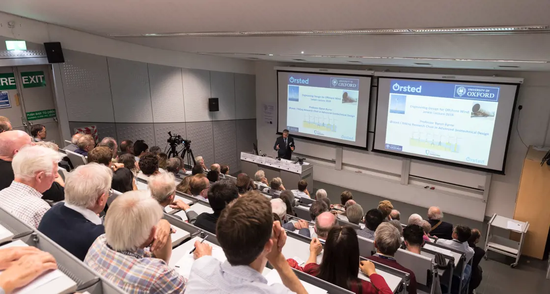 Alumni in Lecture Room 1 listening to a talk
