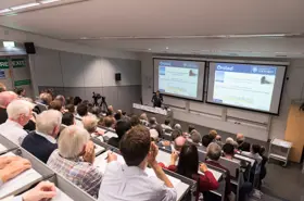 Alumni in Lecture Room 1 listening to a talk
