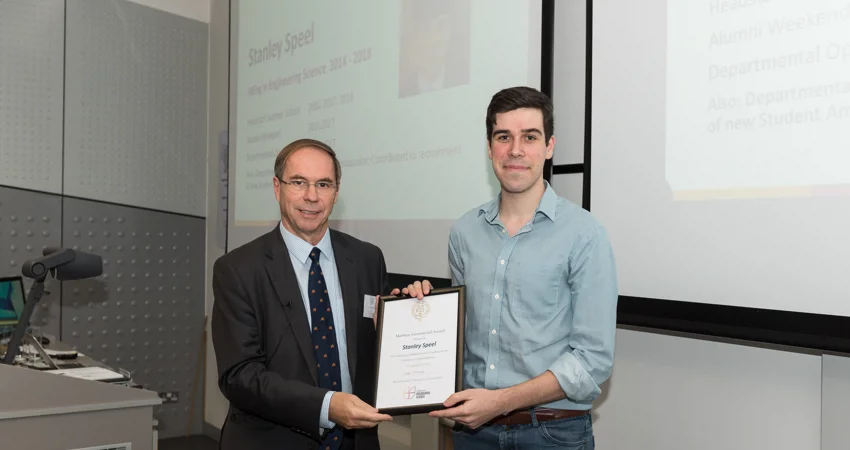 DPhil student recieves Matthew Greenwood award, from head of the department in 2018 Prof Lionel Tarassenko