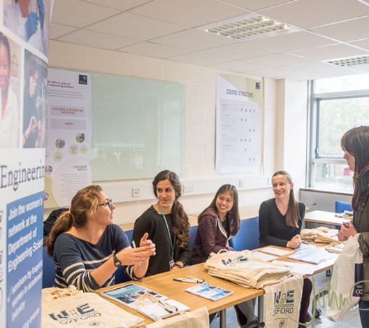 Women in STEM event, January 2020. Female engineers chatting at a stall. Women in Engineering Network