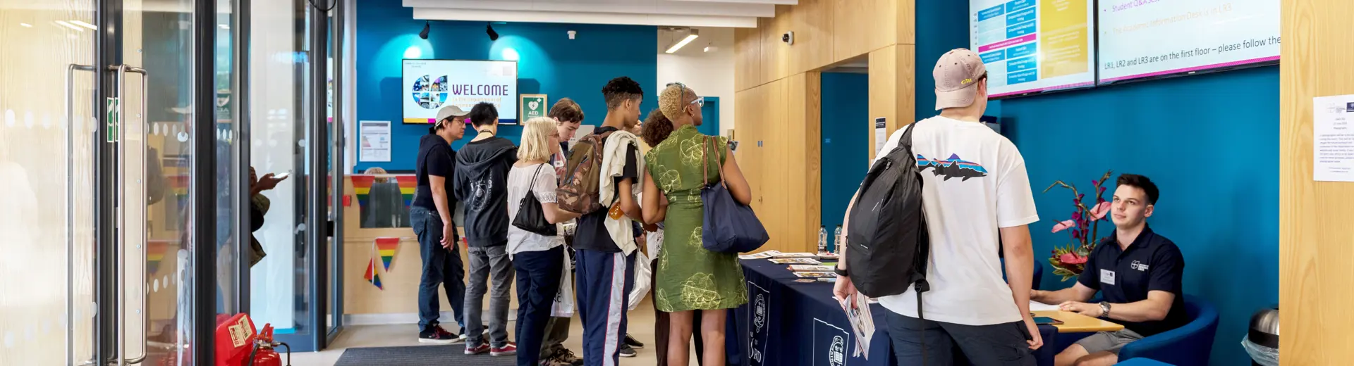 Visitors at the Thom Building reception talking to Student Ambassadors on one of our Summer open days