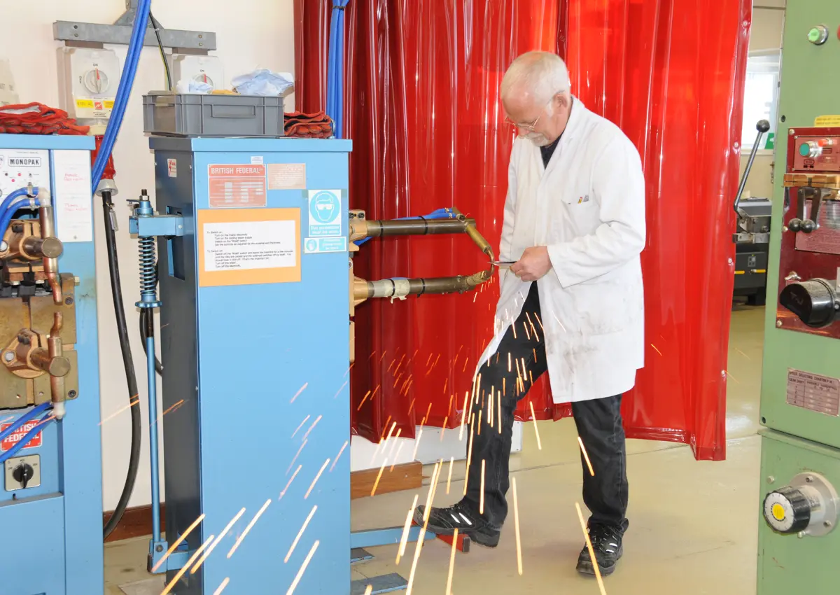 Maurice Keeble-Smith spot-welding in a 2nd year student lab in 2015