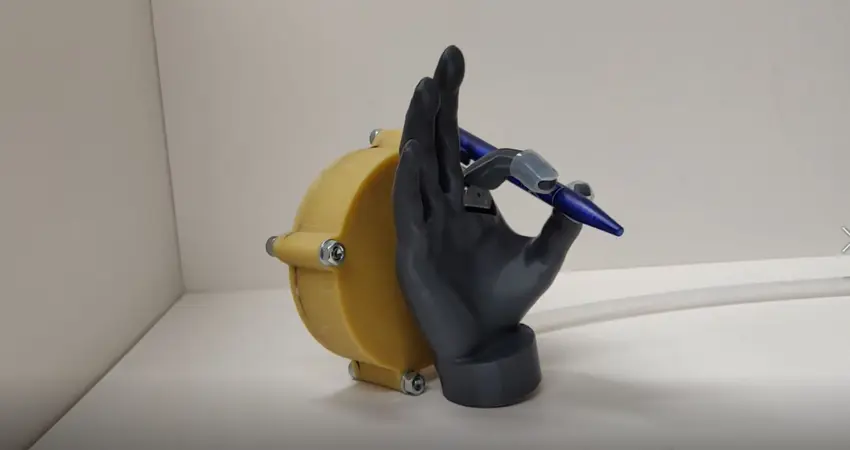 Prosthetic hand holding pen