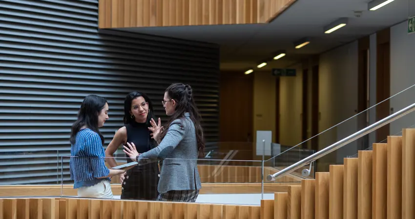 Postgraduate students talking