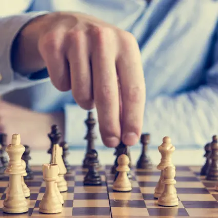 woman studying the next chess move, Stock image