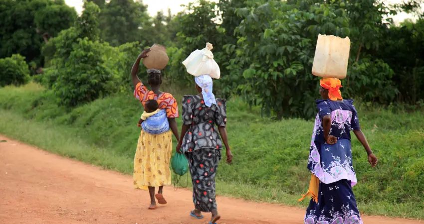 Stock image of traditional water collection in Africa