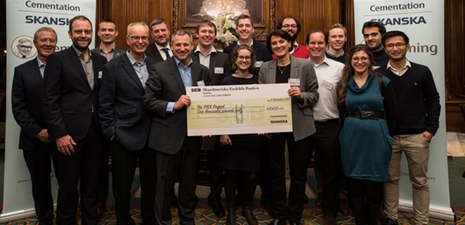 Professor Byron Byrne with members of the PISA Project team holding the winning cheque