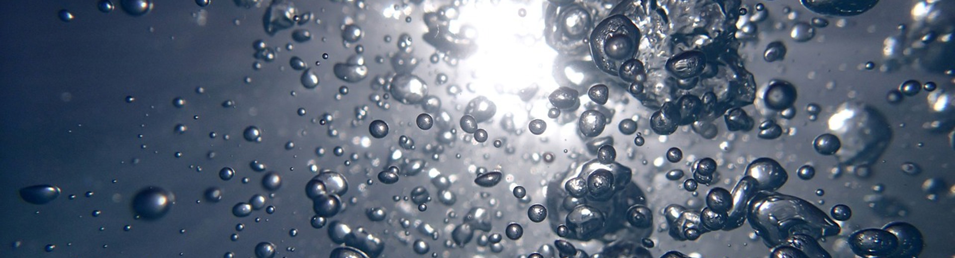 Bubbles in water with sunlight