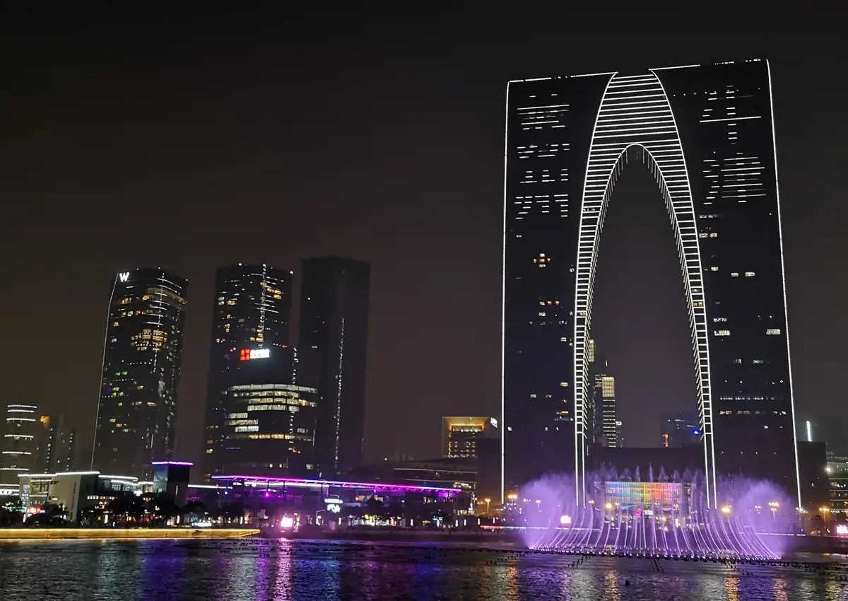 External view of the OSCAR building. Four characters on the skyscraper read 'Suzhou' and 'Niujing', or Oxford