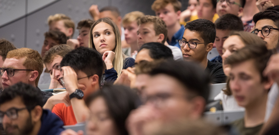 Full lecture theatre of students