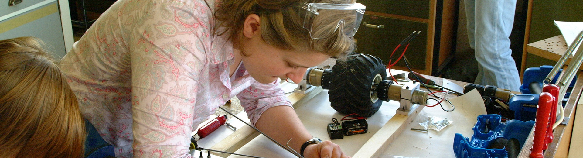 Students working on project on lab bench