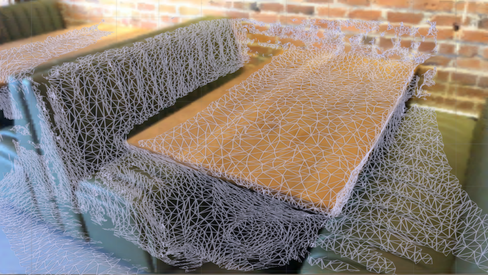 A mesh covering booth seating areas