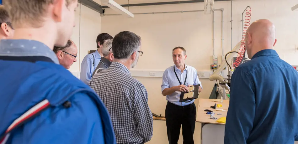 Alumni on a tour of the Department in 2019