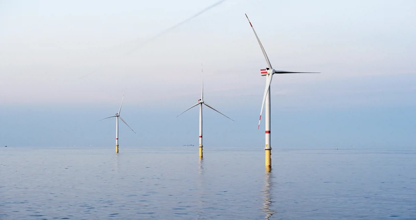 Gode wind farm off the coast of Germany showing three turbines in the sea