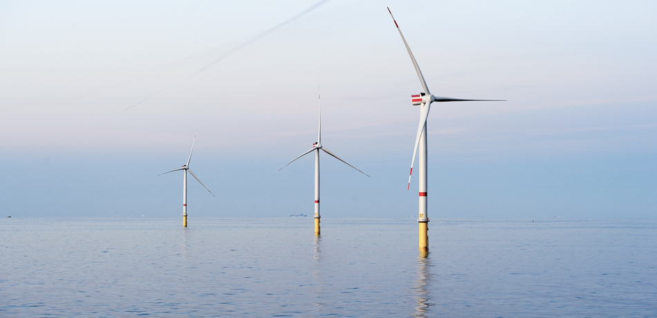 Gode wind farm off the coast of Germany showing three turbines in the sea