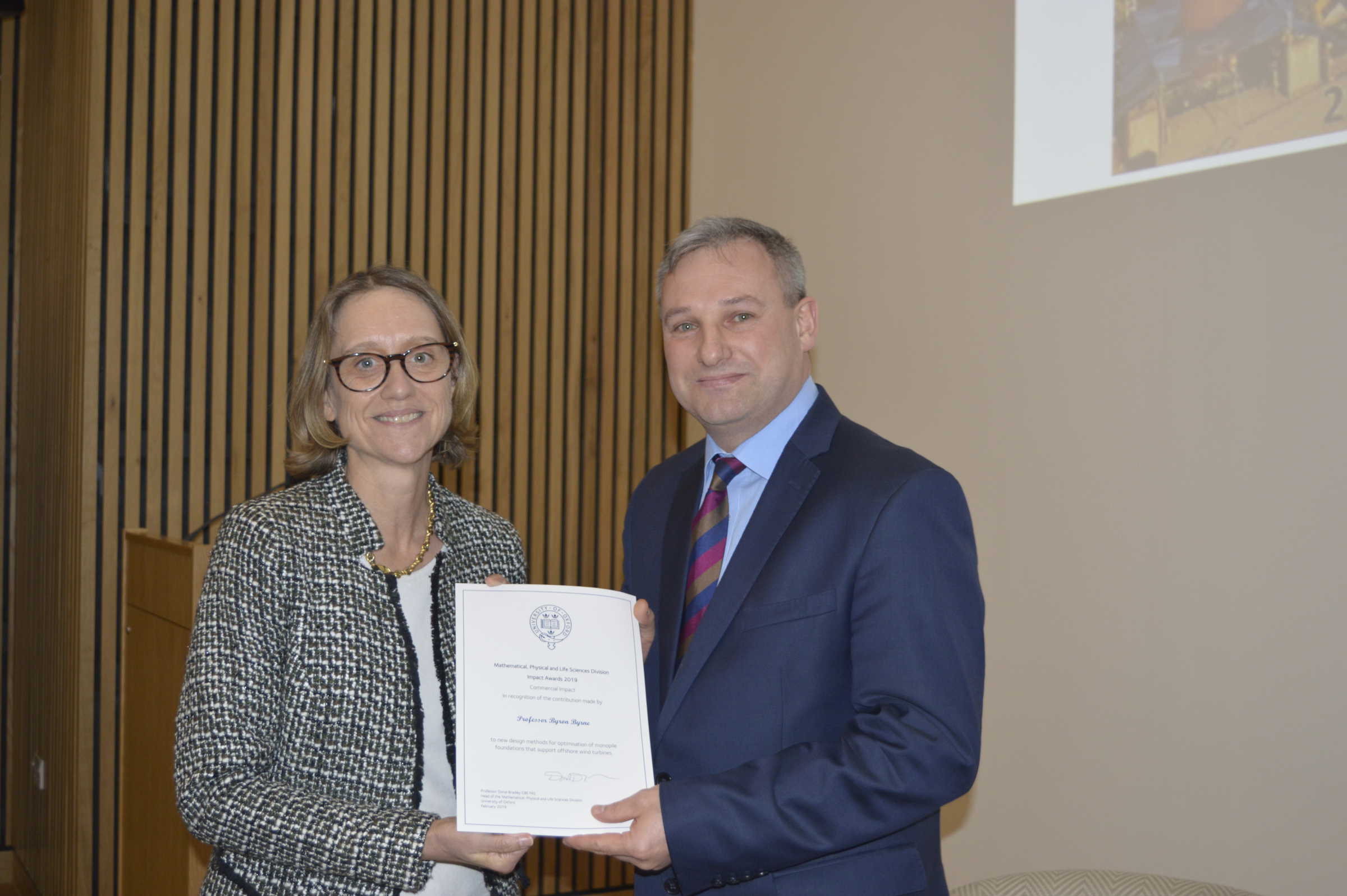 Professor Byron Byrne receiving MPLS Impact Award in Commercial Impact Category