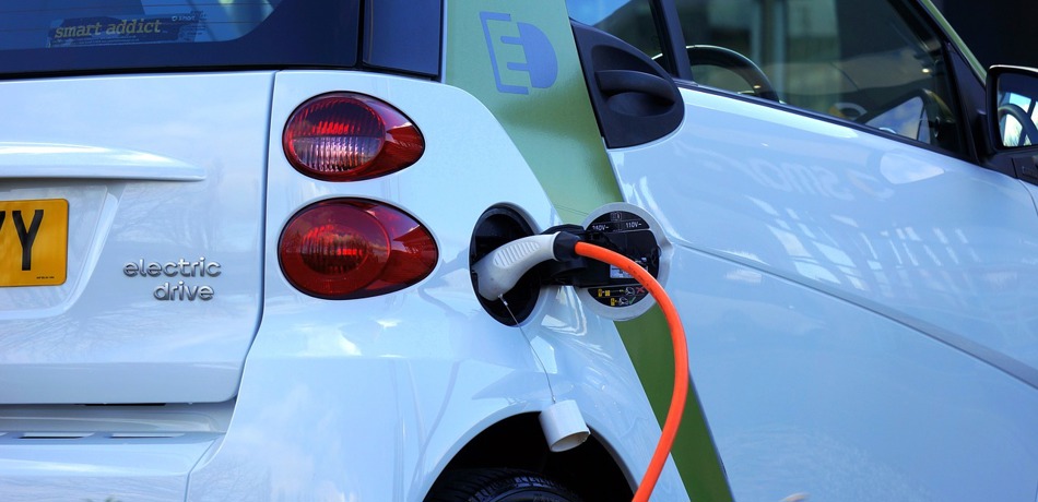 Stock image of electric car being charged