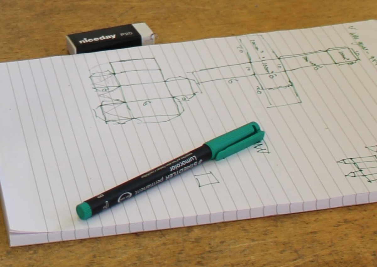 Sketched out diagram on notepad