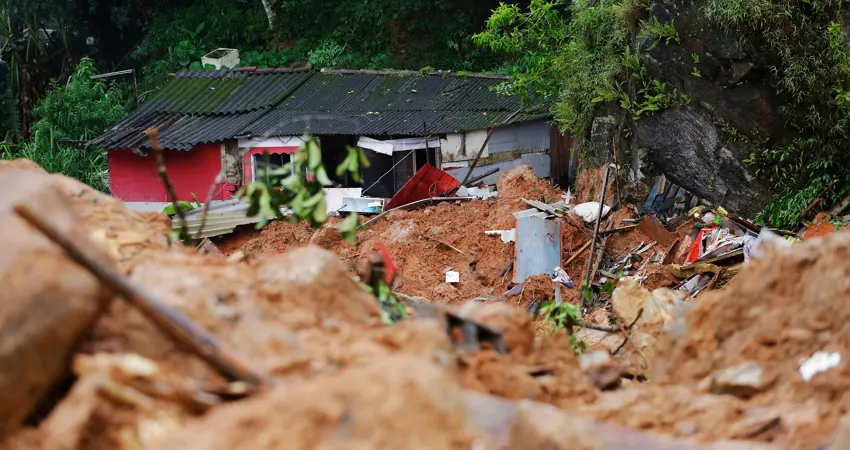 A house stands damaged by a landslide caused by heavy rains in the southeastern coast of Guarujá, São Paulo state, Brazil.