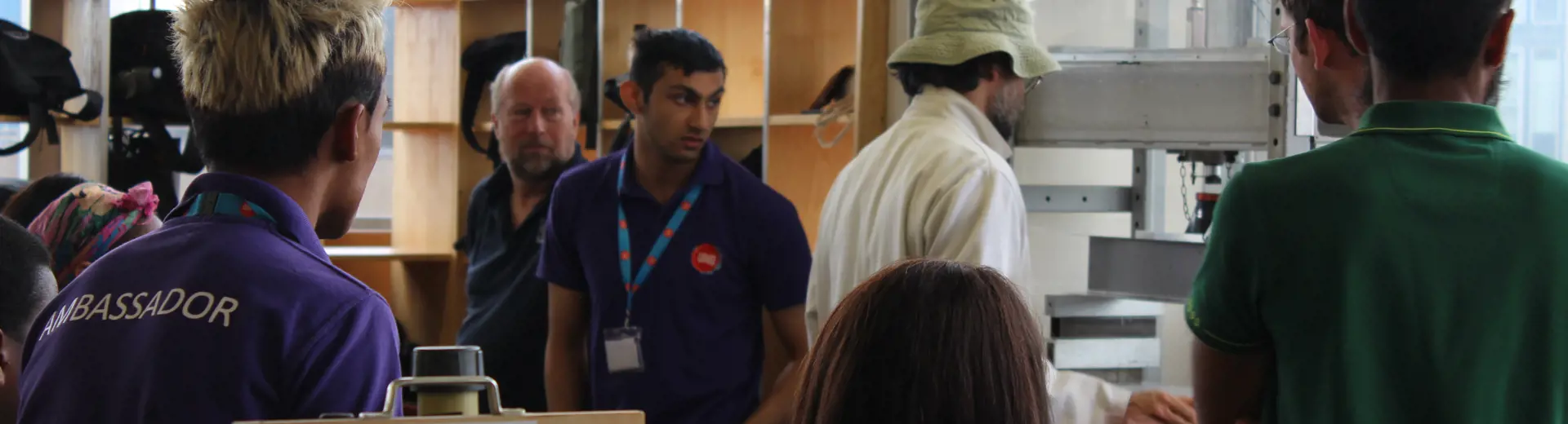 Demonstration of equipment in lab to school students during outreach programme
