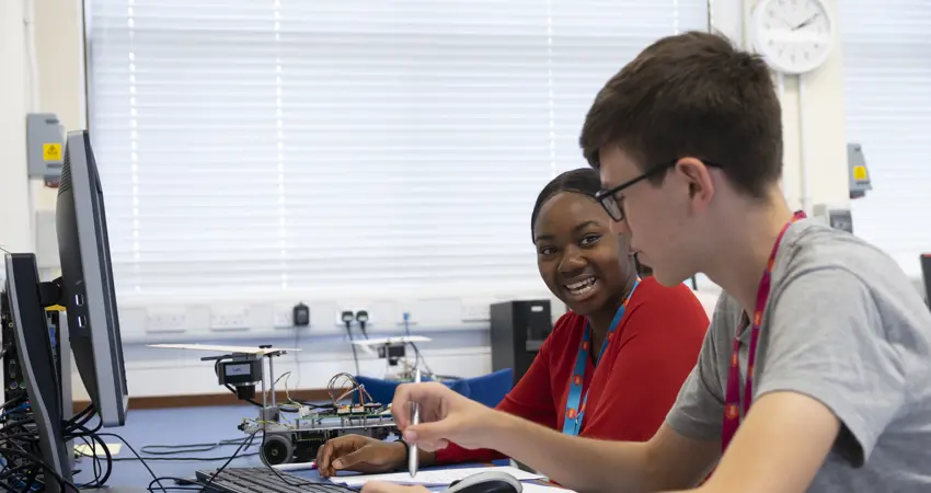 Students discussing work