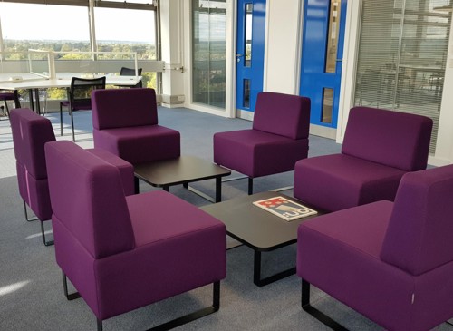Student study area, large comfortable chairs in a circle for discussion