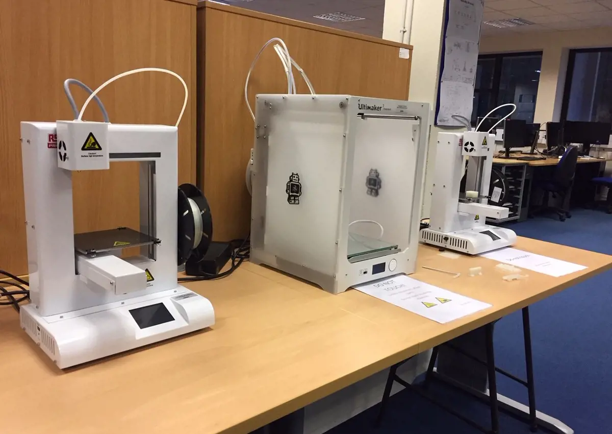 Three tabletop 3D printers
