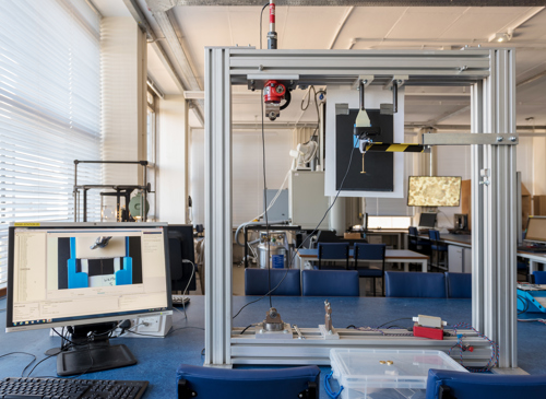 Mechanical lab equipment set up and computer screen