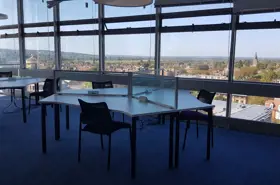 Study area with large windows overlooking Oxford