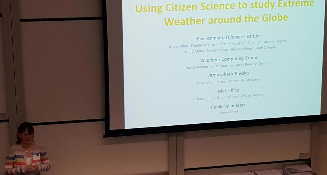 Dr Sarah Sparrow presenting on citizen science for study of extreme weather at researcher event