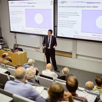 Man lecturing to audience