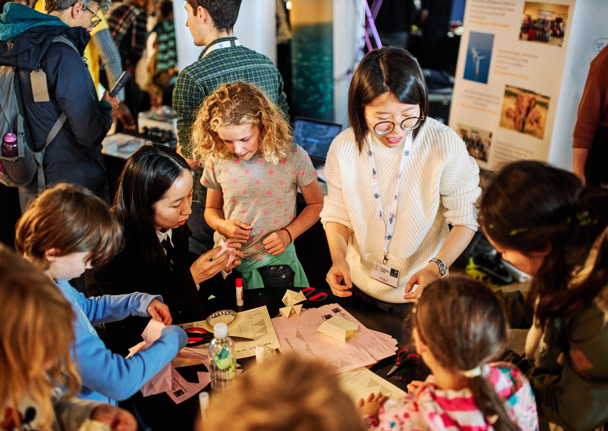 Kids learning about science with researchers