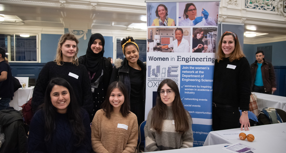 Female DPhil students at Women in STEM event in Oxford Town Hall, January 2020. Stood by Women in Engineering network banner