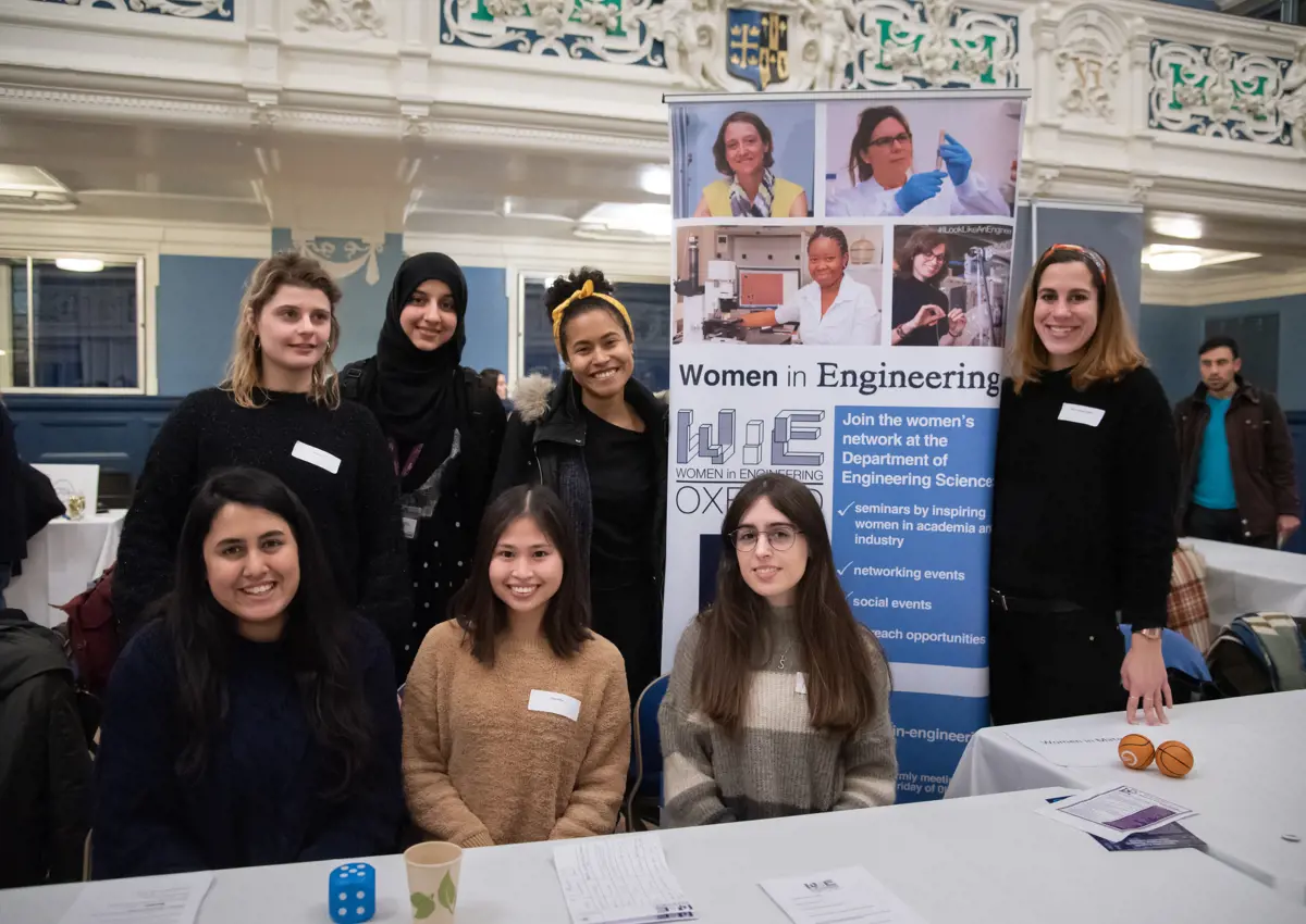 Female DPhil students at Women in STEM event in Oxford Town Hall, January 2020. Stood by Women in Engineering network banner