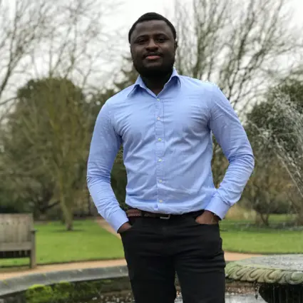 Young man smiling in smart clothes