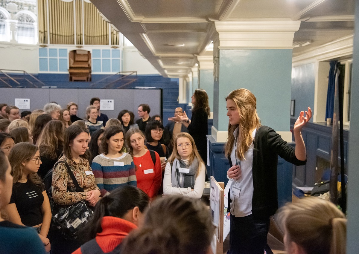 DPhil student Elisabeth Pickles talks to a room full of people at Women in STEM event at Oxford Town Hall, January 2020.