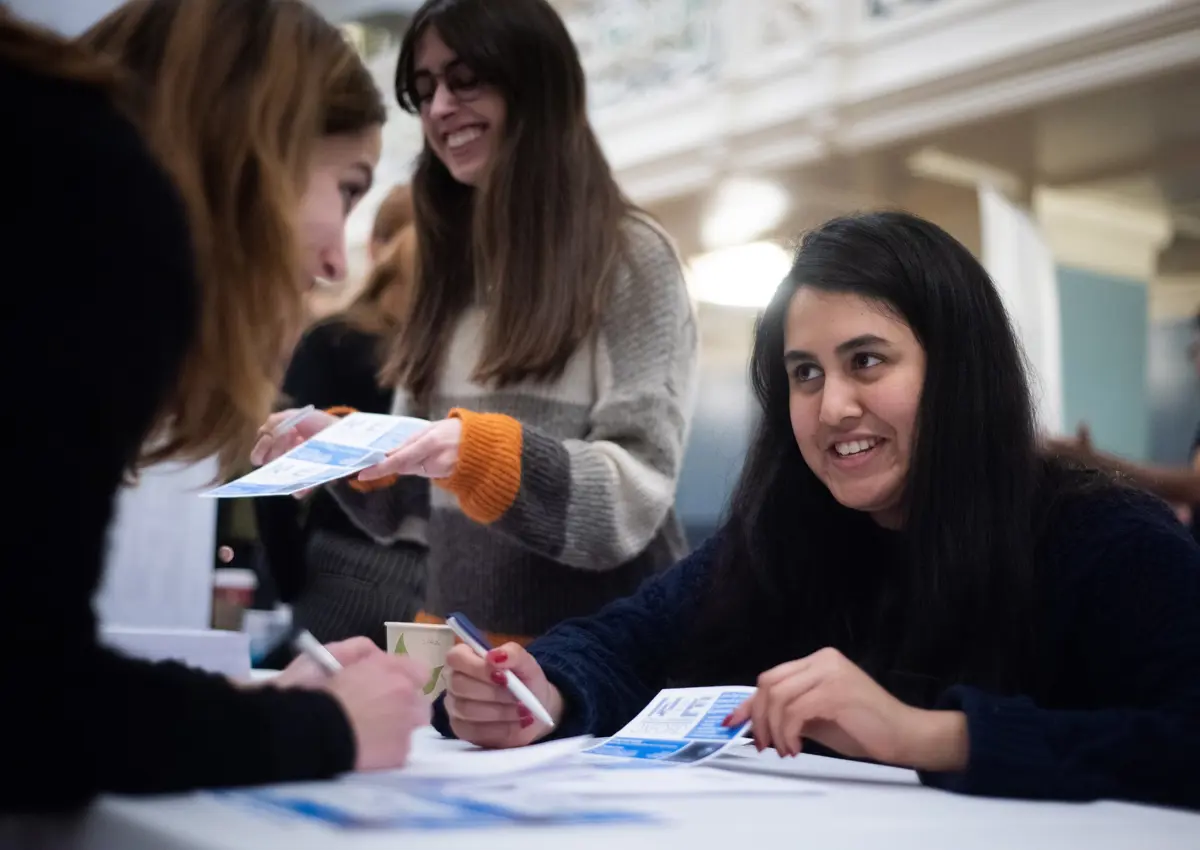 Women in STEM event, January 2020. Female engineers chatting at a stall