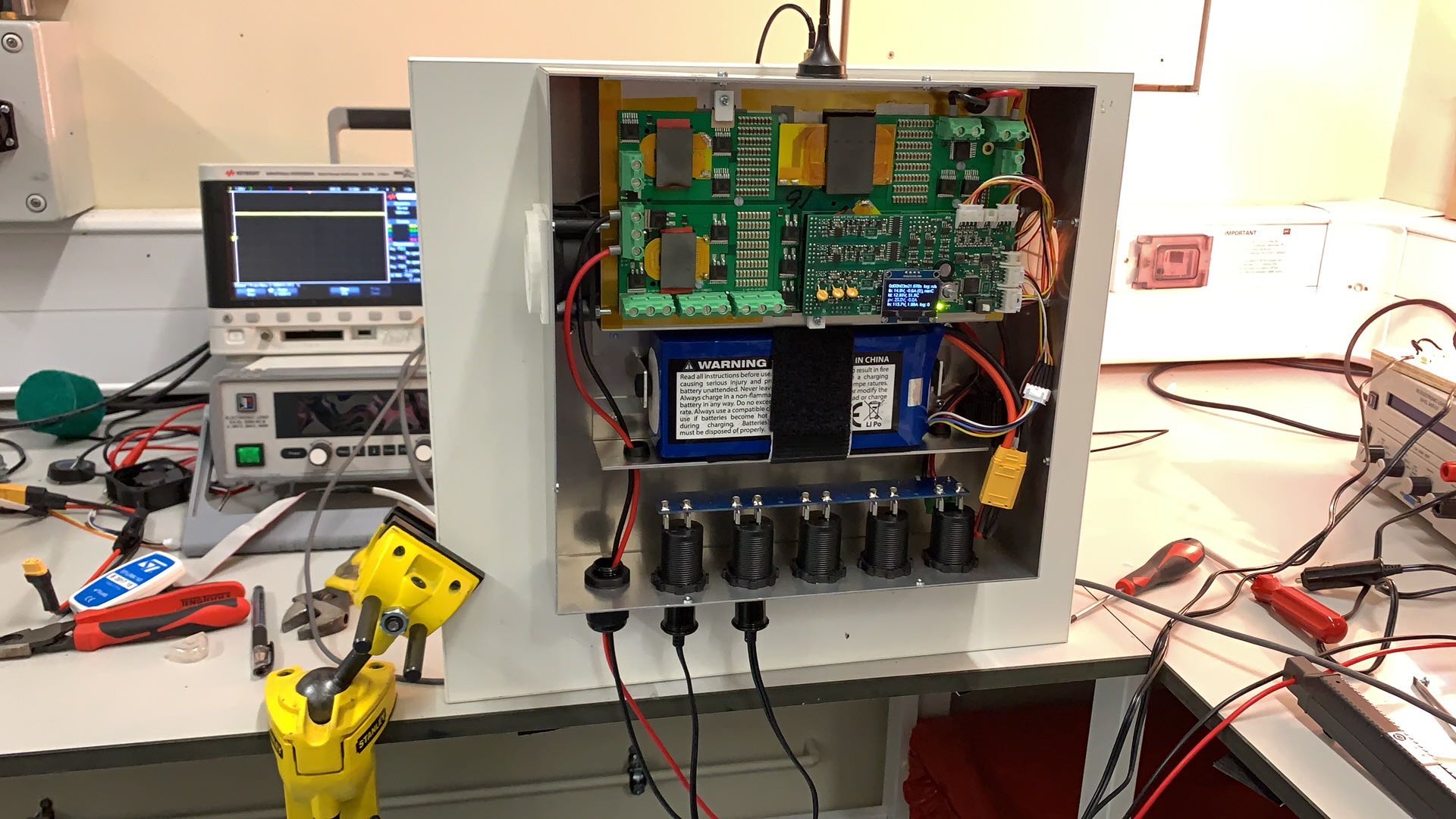 Circuits, wires and electronics showing in an open box as part of the RELCON project.