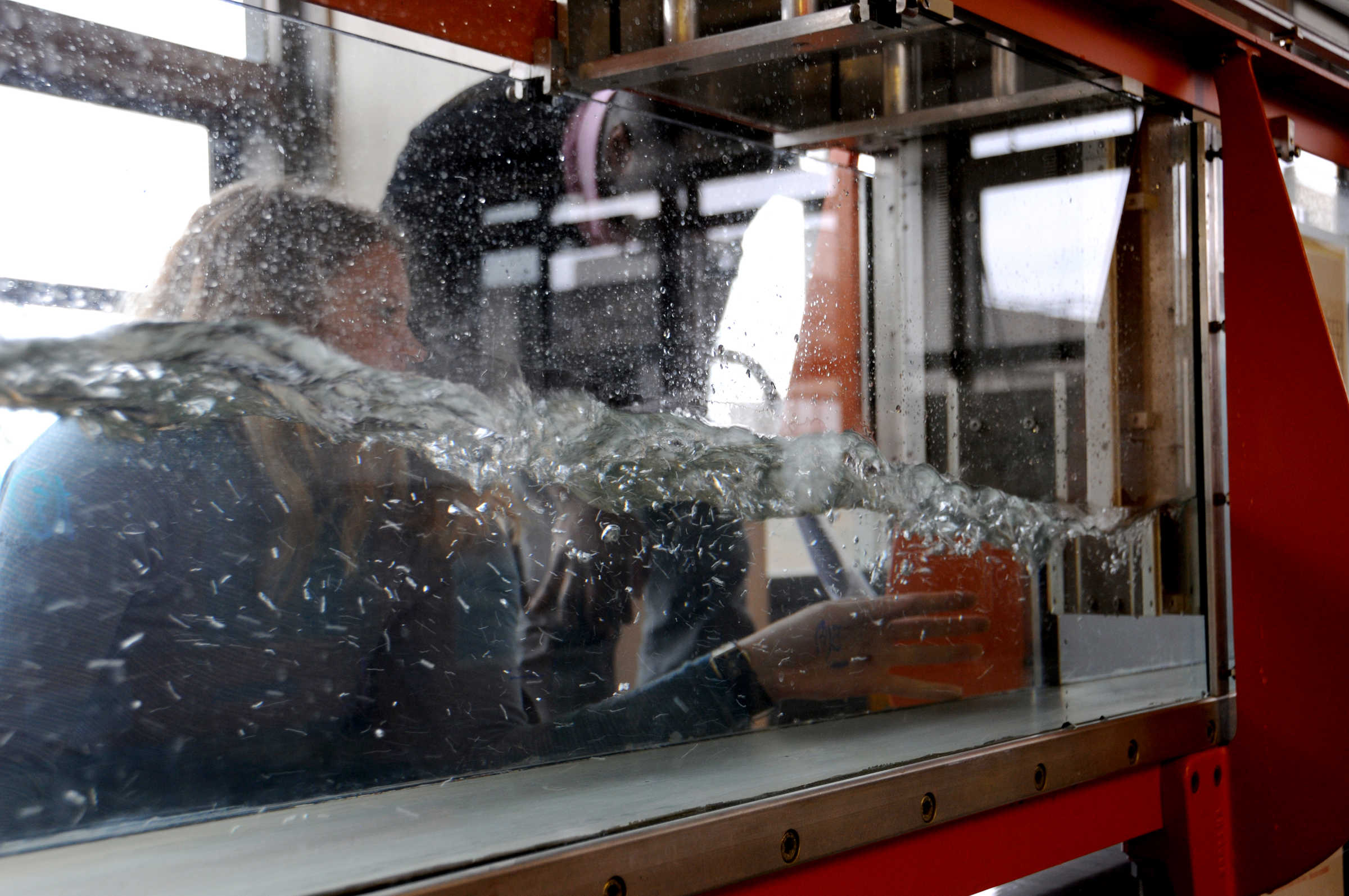 Student using hydraulics lab equipment
