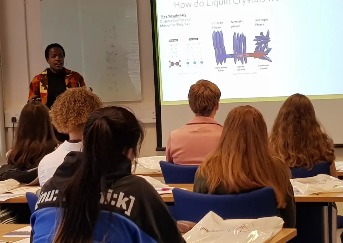 Students listening to presenter in class