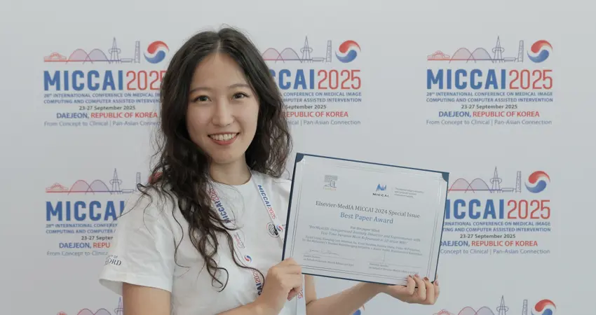 Ziyun Liang with her award certificate