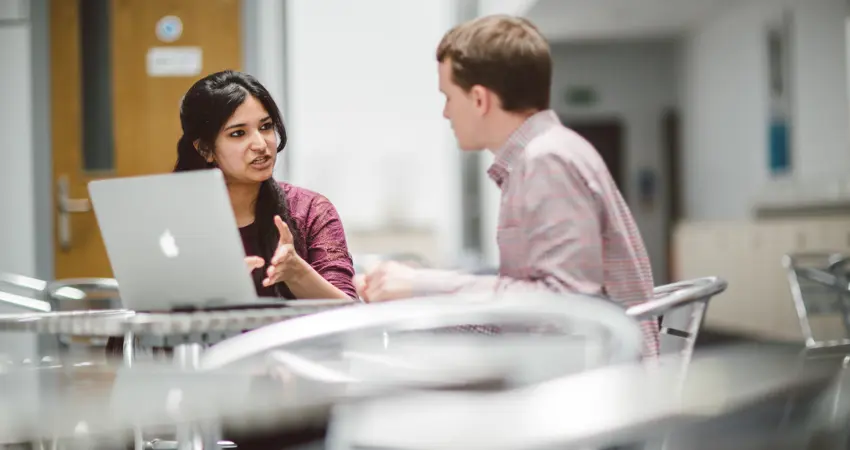 Computer science students talking