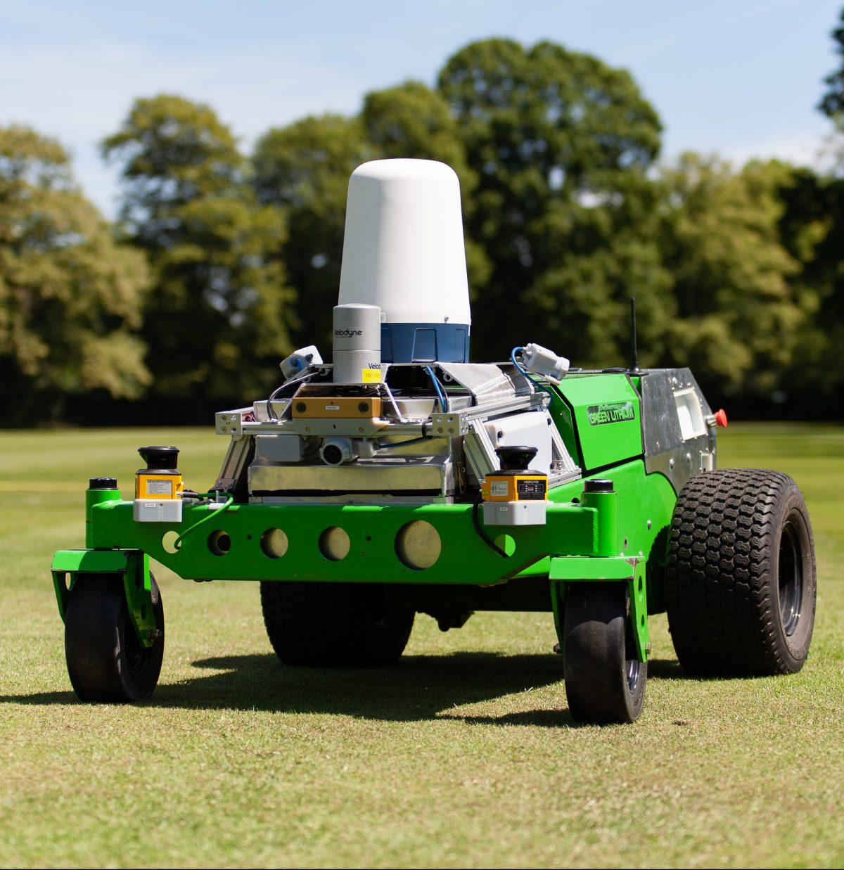 HULK robot on green field of grass. 