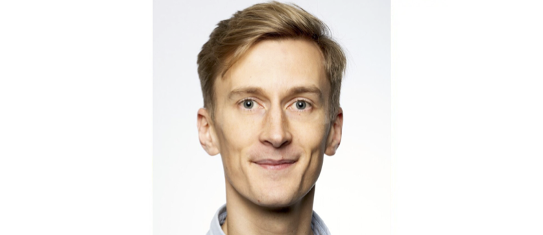 A picture of Alex's face on top of a white background