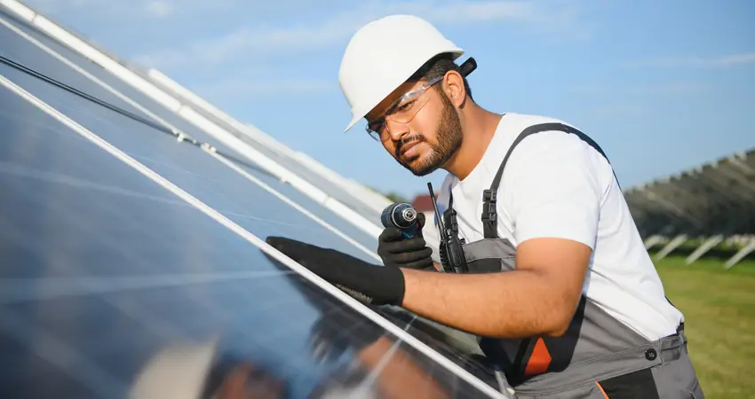 Engineer installing solar panels