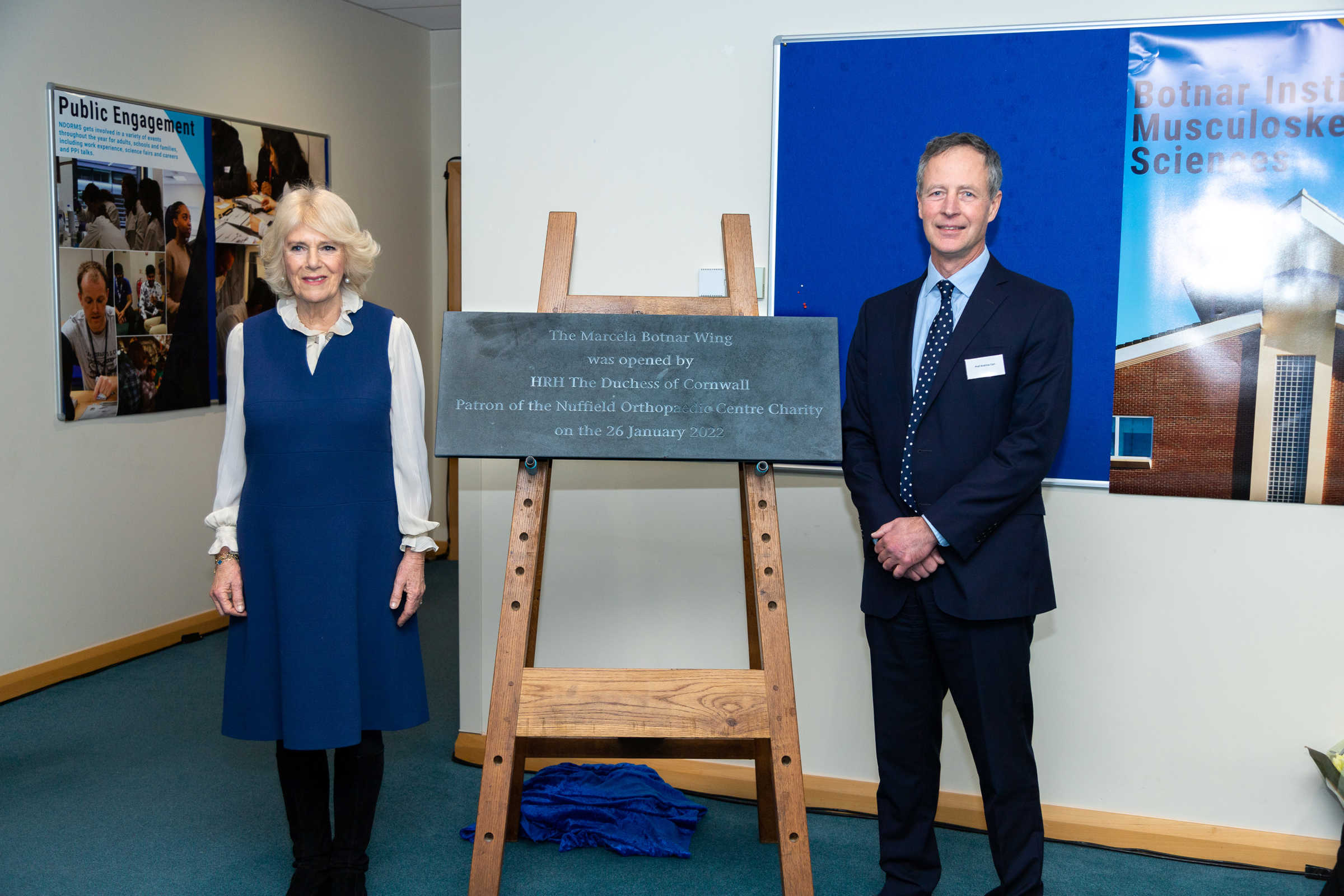 HRH The Duchess of Cornwall unveils a plaque to mark the opening of the Marcela Botnar wing, with Professor Andrew Carr