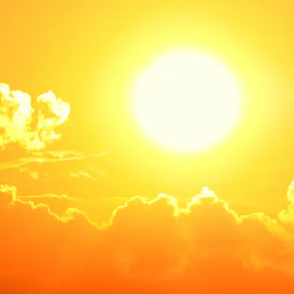 The Sun rising above the clouds