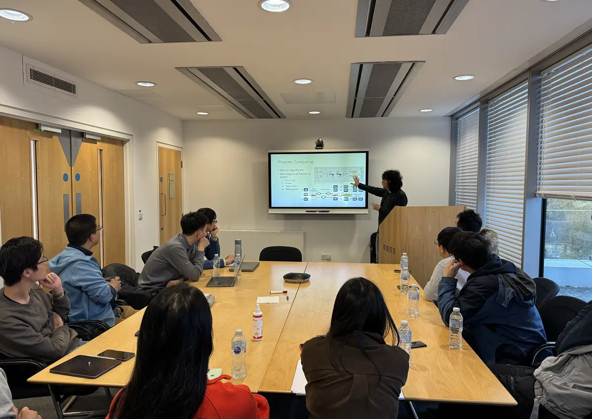 An Aloysius Wang (Lou) presenting in a group meeting